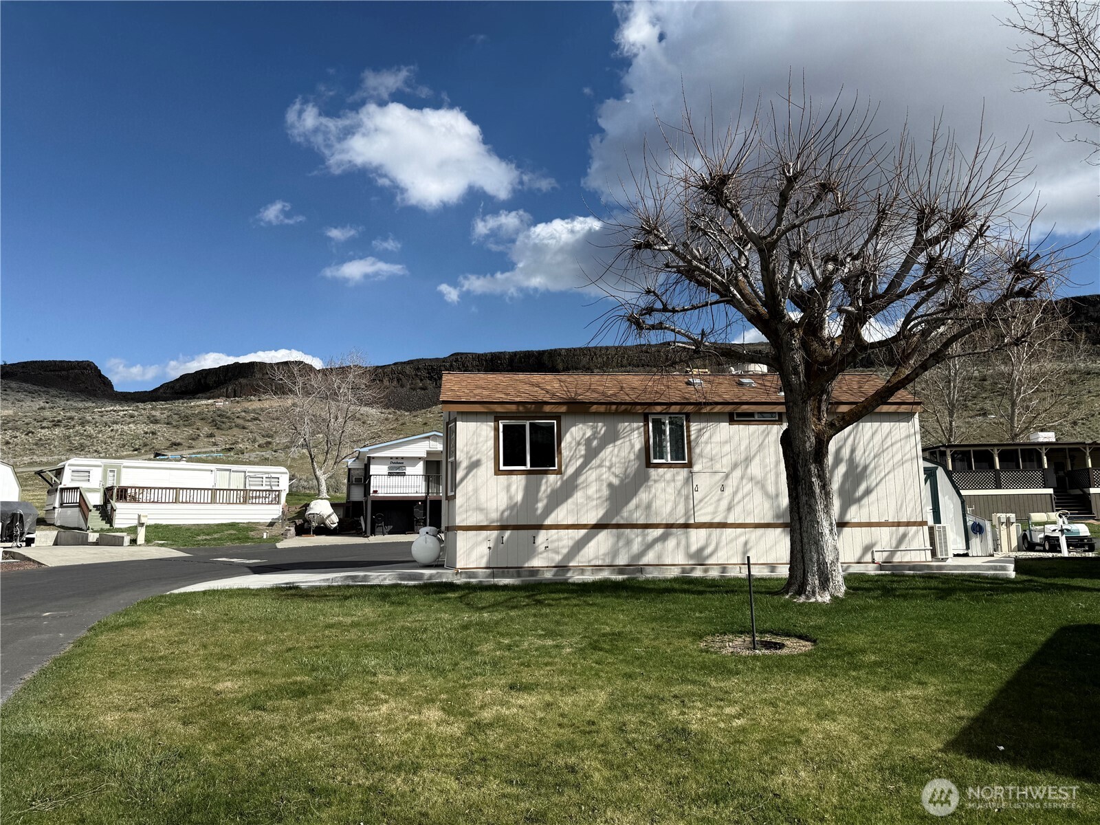 31465 Moore Road Northeast, Unit 801 Coulee City, WA 99115 - Photo 2 of 38 a view of a house with backyard