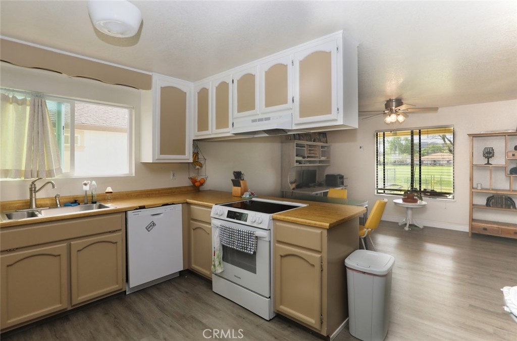 19425 Old Creek Road Hidden Valley Lake, CA 95467 - Photo 11 of 41 a kitchen that has a sink and a stove in it