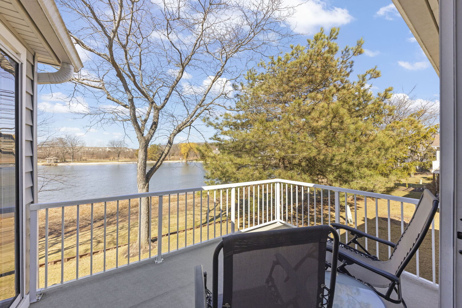 -n204 Windermere Road, Unit 2708 Winfield, IL 60190 - Photo 13 of 36 a view of a chairs and table in the balcony