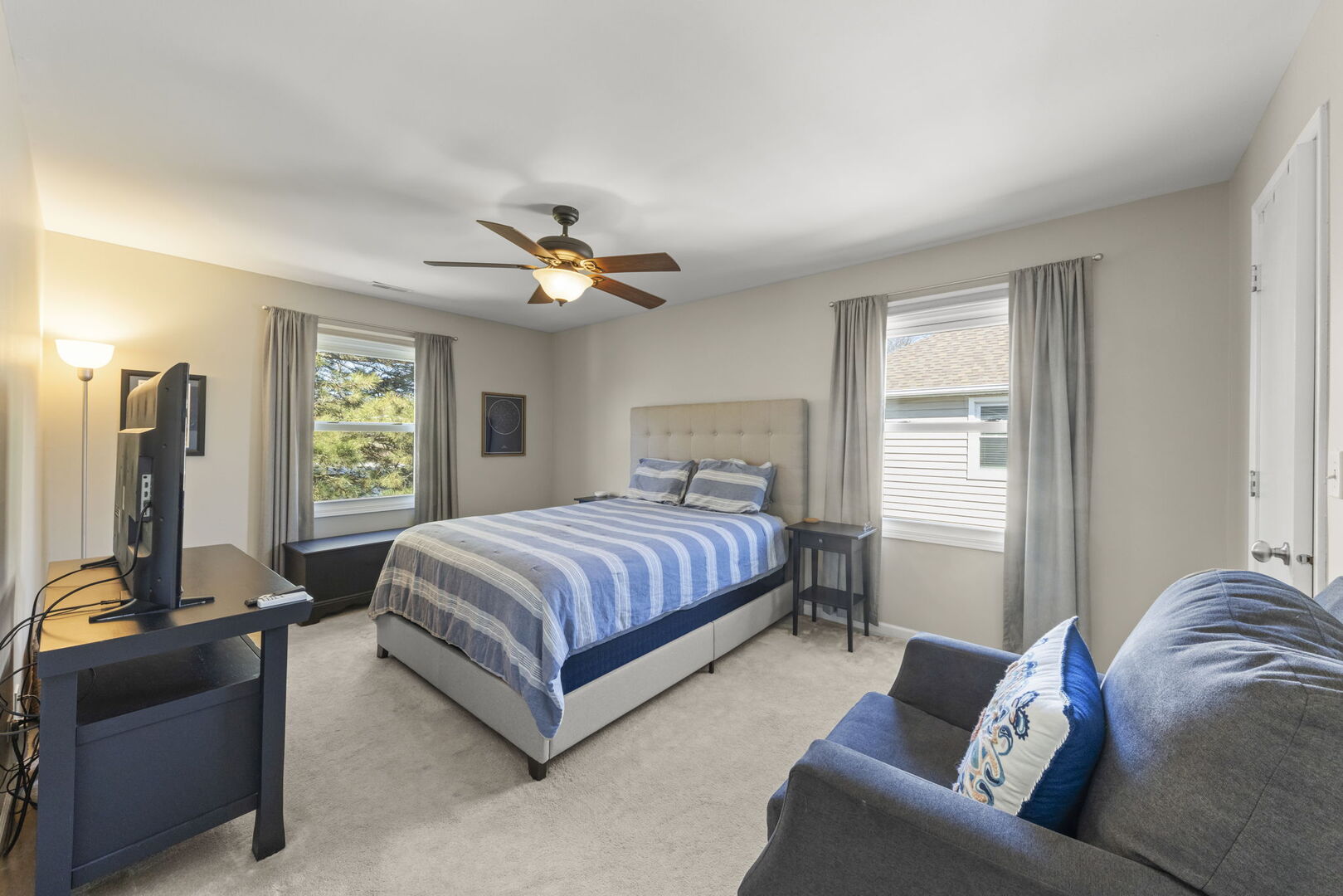 -n204 Windermere Road, Unit 2708 Winfield, IL 60190 - Photo 16 of 36 a spacious bedroom with a bed and a couch