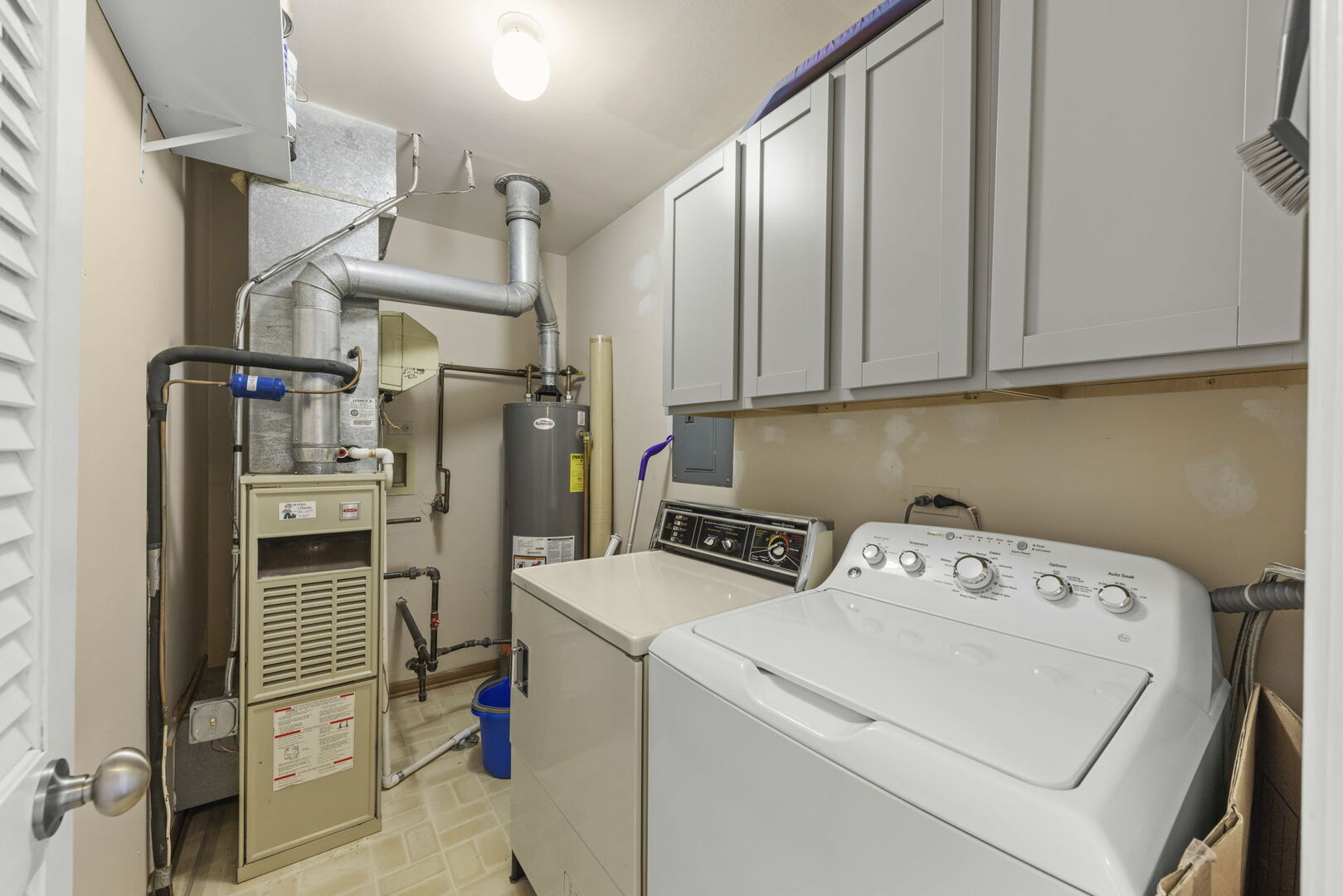 -n204 Windermere Road, Unit 2708 Winfield, IL 60190 - Photo 21 of 36 a view of storage and utility room with washer and dryer