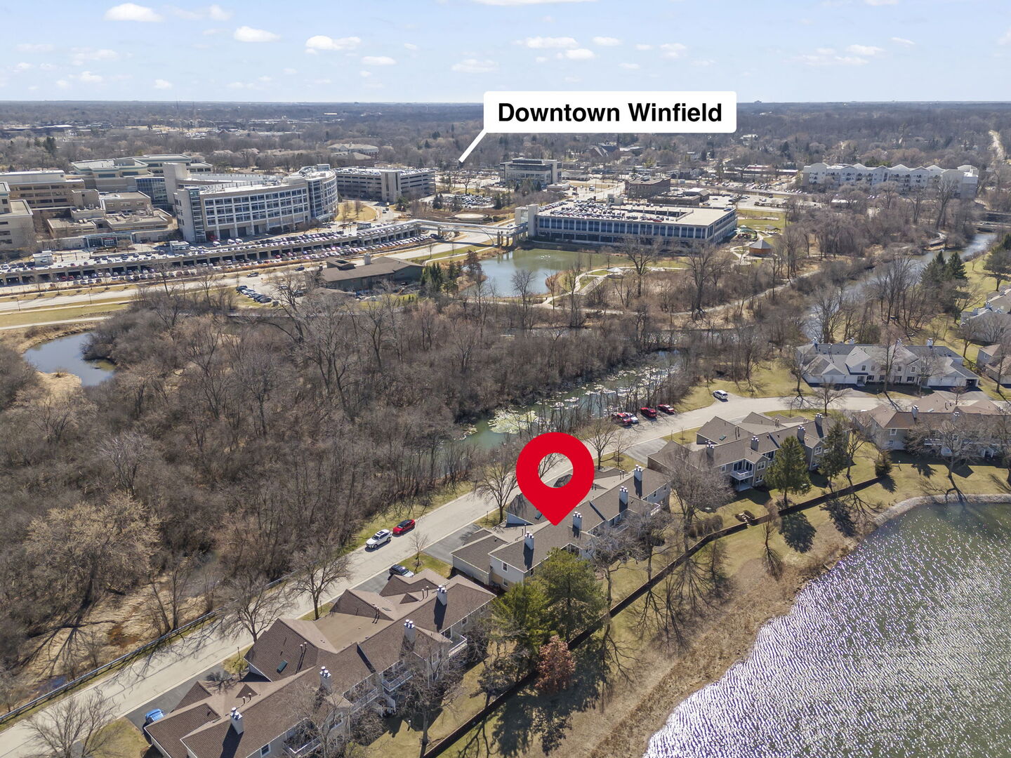 -n204 Windermere Road, Unit 2708 Winfield, IL 60190 - Photo 23 of 36 an aerial view of a gallery with table and chairs