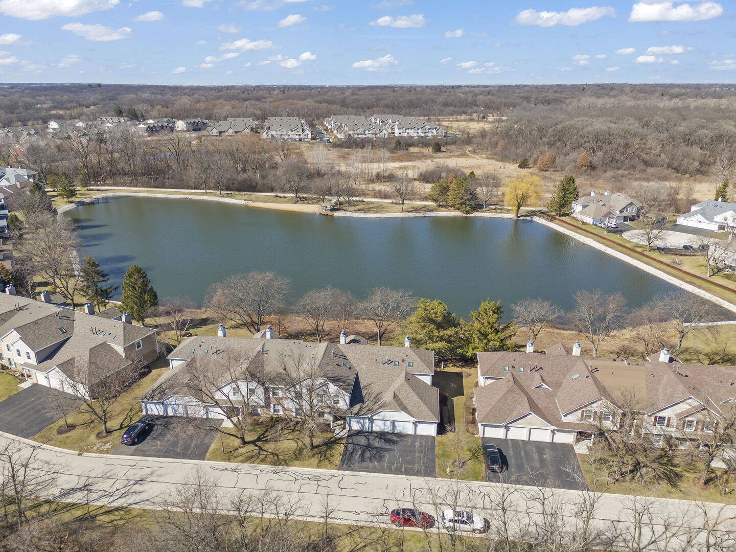 -n204 Windermere Road, Unit 2708 Winfield, IL 60190 - Photo 24 of 36 an aerial view of a house with a lake view