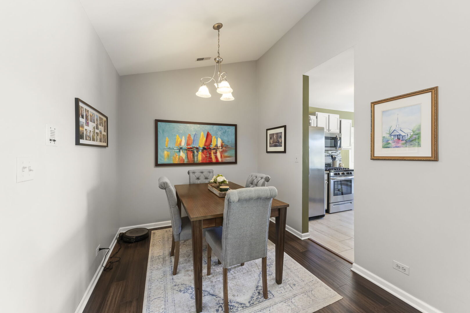 -n204 Windermere Road, Unit 2708 Winfield, IL 60190 - Photo 8 of 36 a view of a dining room with furniture and wooden floor