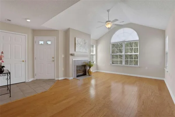 a bedroom with a bed and a fireplace