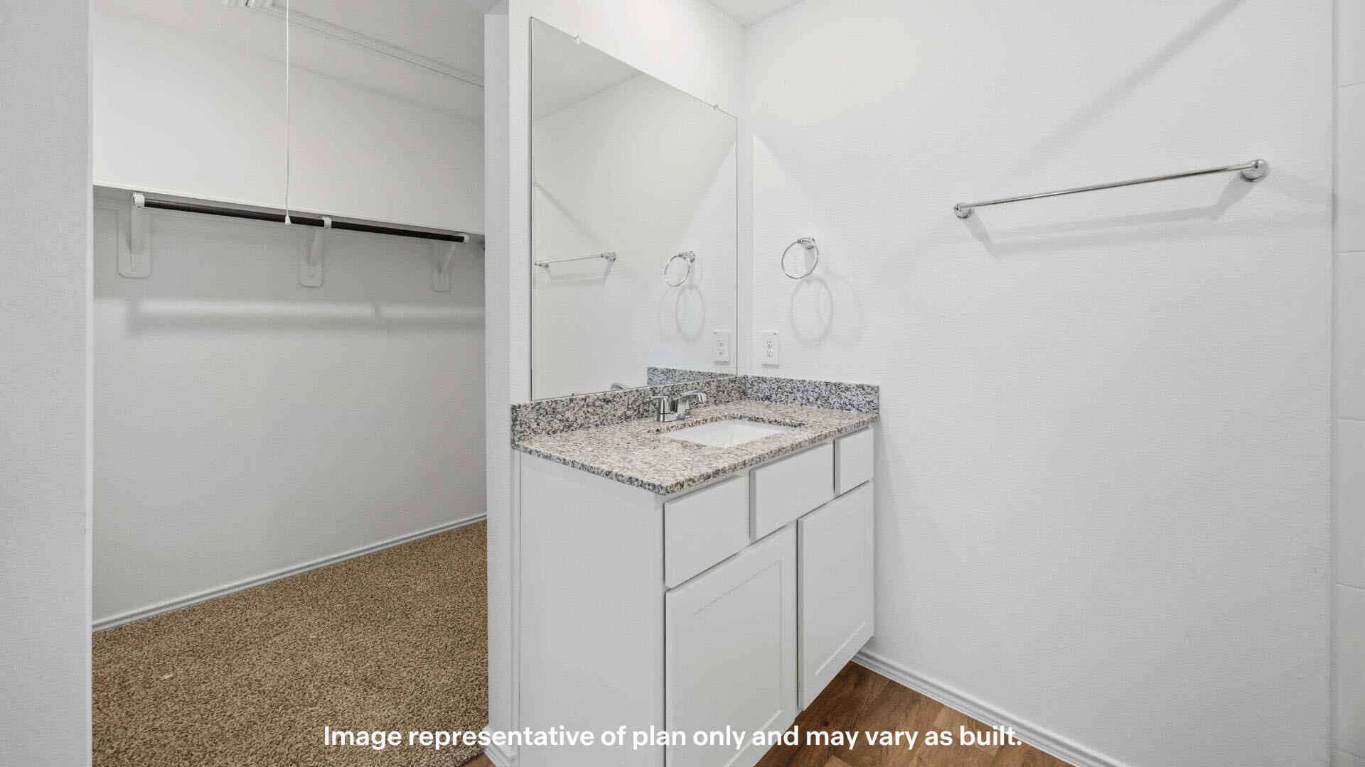 7441 10th Street Lubbock, TX 79416 - Photo 5 of 25 a utility room with washer and dryer