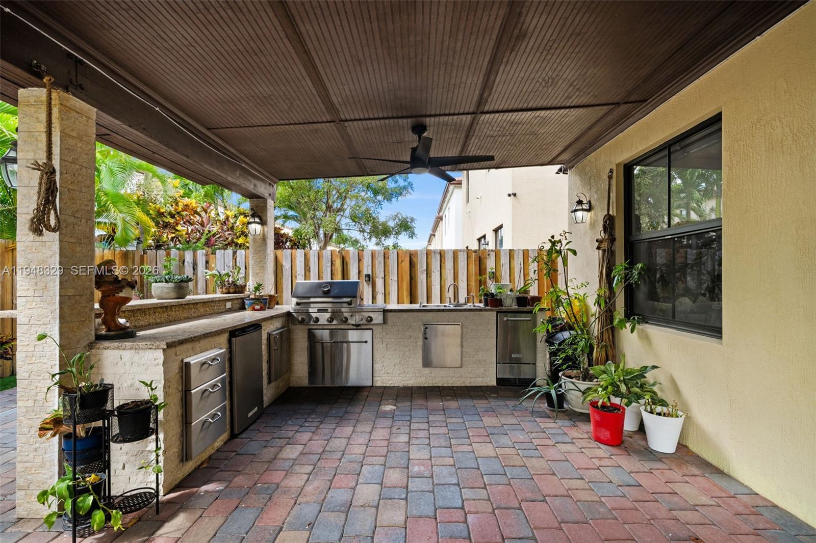 8658 Northwest 99th Path Doral, FL 33178 - Photo 4 of 46 a kitchen with a sink and a stove