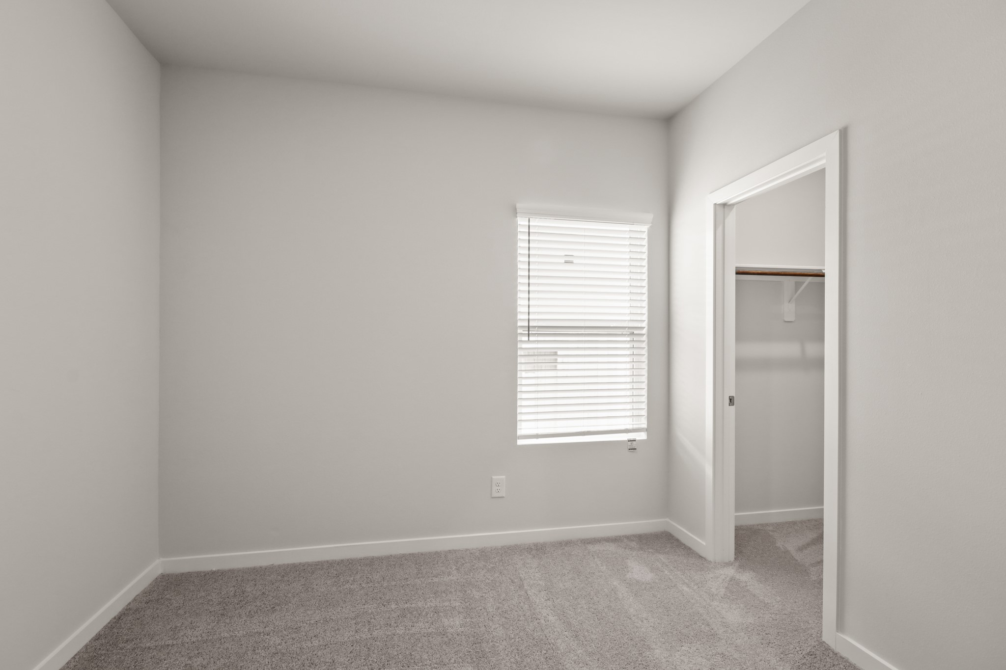 774 Guernsey Road La Marque, TX 77568 - Photo 9 of 22 an empty room with windows