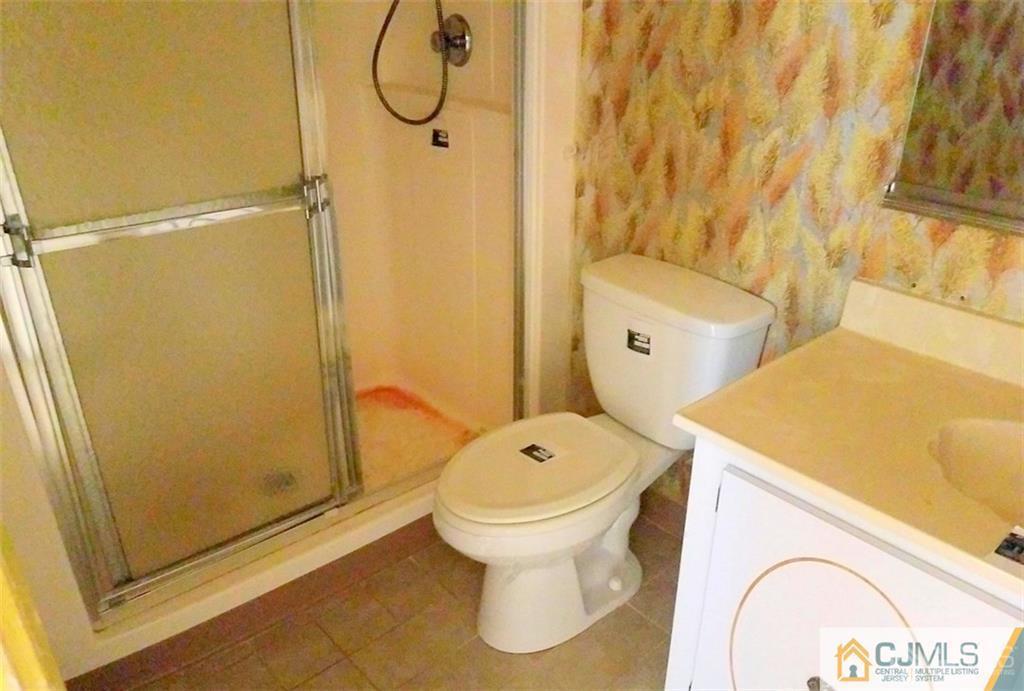 40 C Haddon Road Monroe Township, NJ 08831 - Photo 12 of 12 a bathroom with a sink and toilet