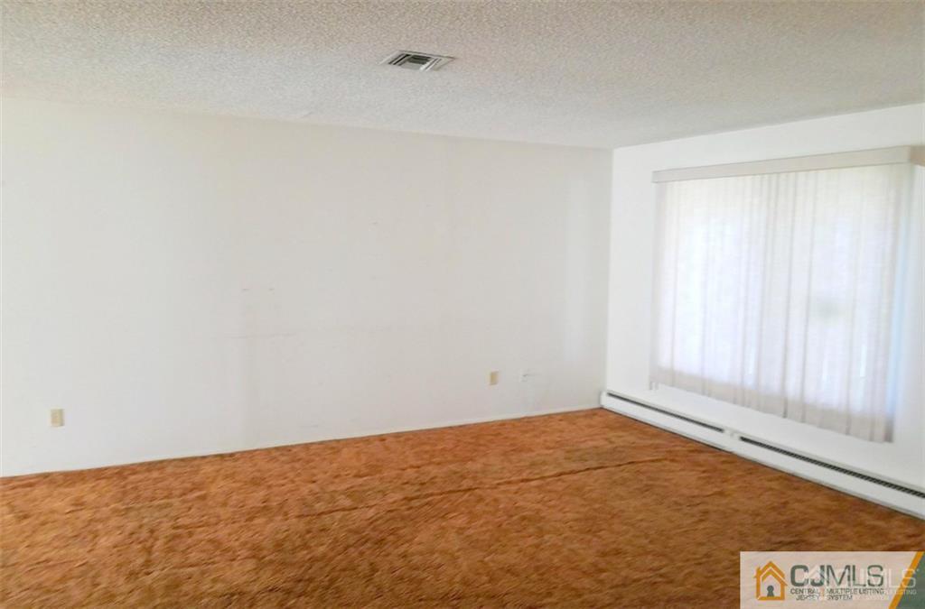 40 C Haddon Road Monroe Township, NJ 08831 - Photo 3 of 12 a view of an empty room