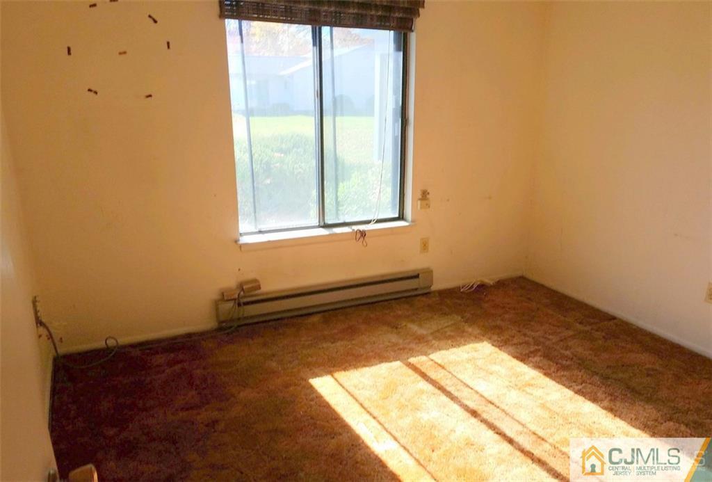 40 C Haddon Road Monroe Township, NJ 08831 - Photo 8 of 12 a view of a room that has a window in it