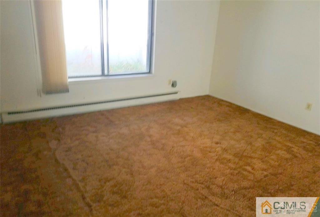 40 C Haddon Road Monroe Township, NJ 08831 - Photo 10 of 12 an empty room with a window