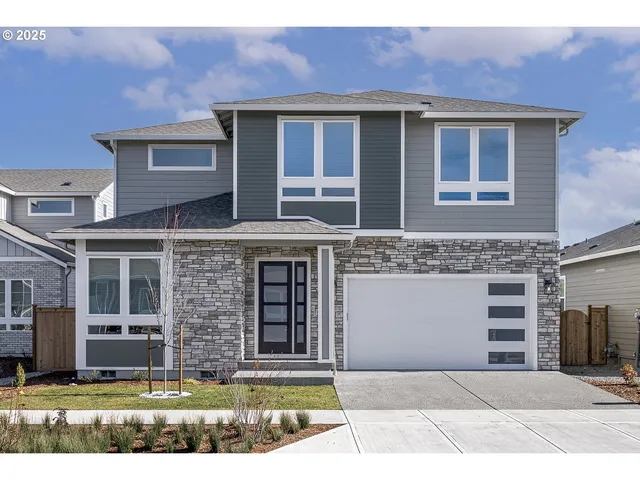 a front view of a house with yard