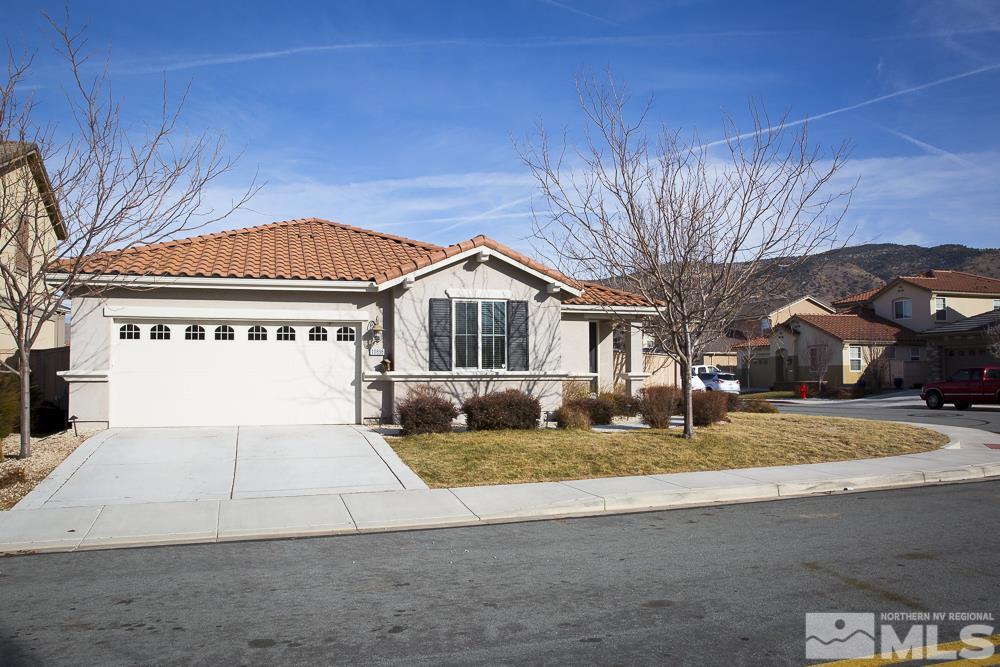 10898 Oakhaven Drive Reno, NV 89521 - Photo 1 of 19 a front view of a house with a yard