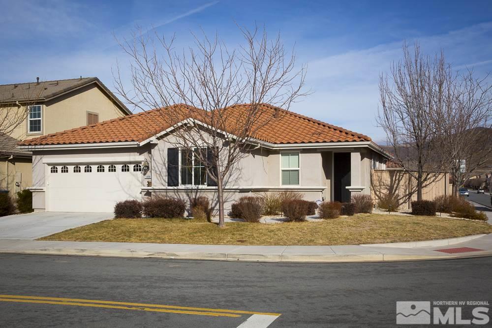 10898 Oakhaven Drive Reno, NV 89521 - Photo 2 of 19 a front view of a house with a yard