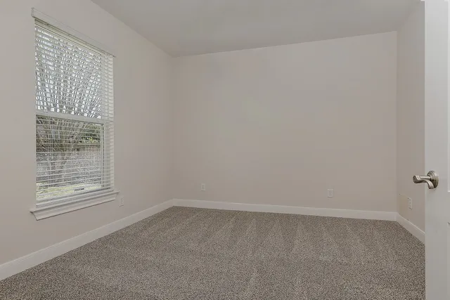 an empty room with a window