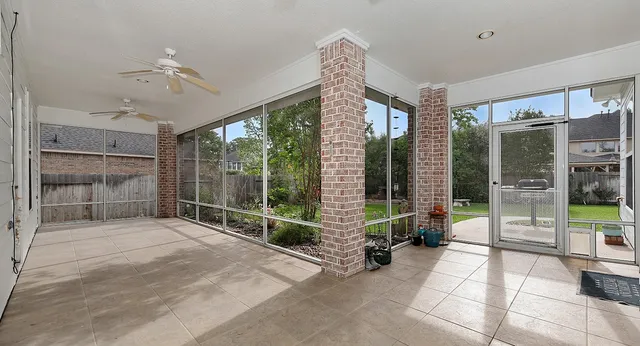 a view of livingroom with furniture and floor to ceiling window
