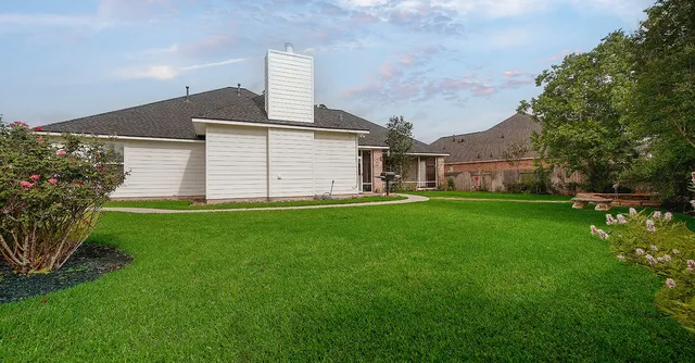 a front view of house with garden