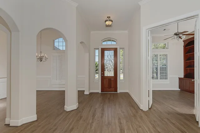 an entryway at livingroom with furniture and wooden floor