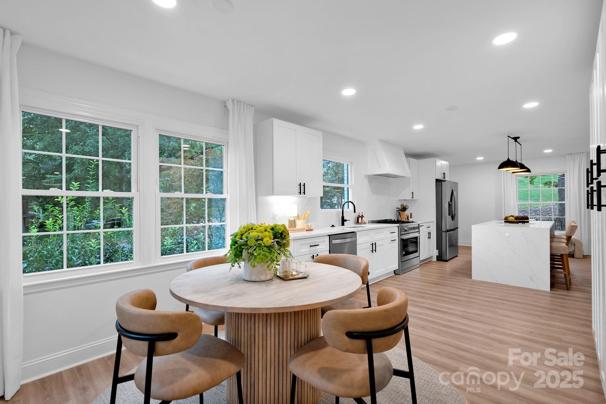 3200 Highview Road Charlotte, NC 28210 - Photo 16 of 48 a kitchen with a table and chairs in it