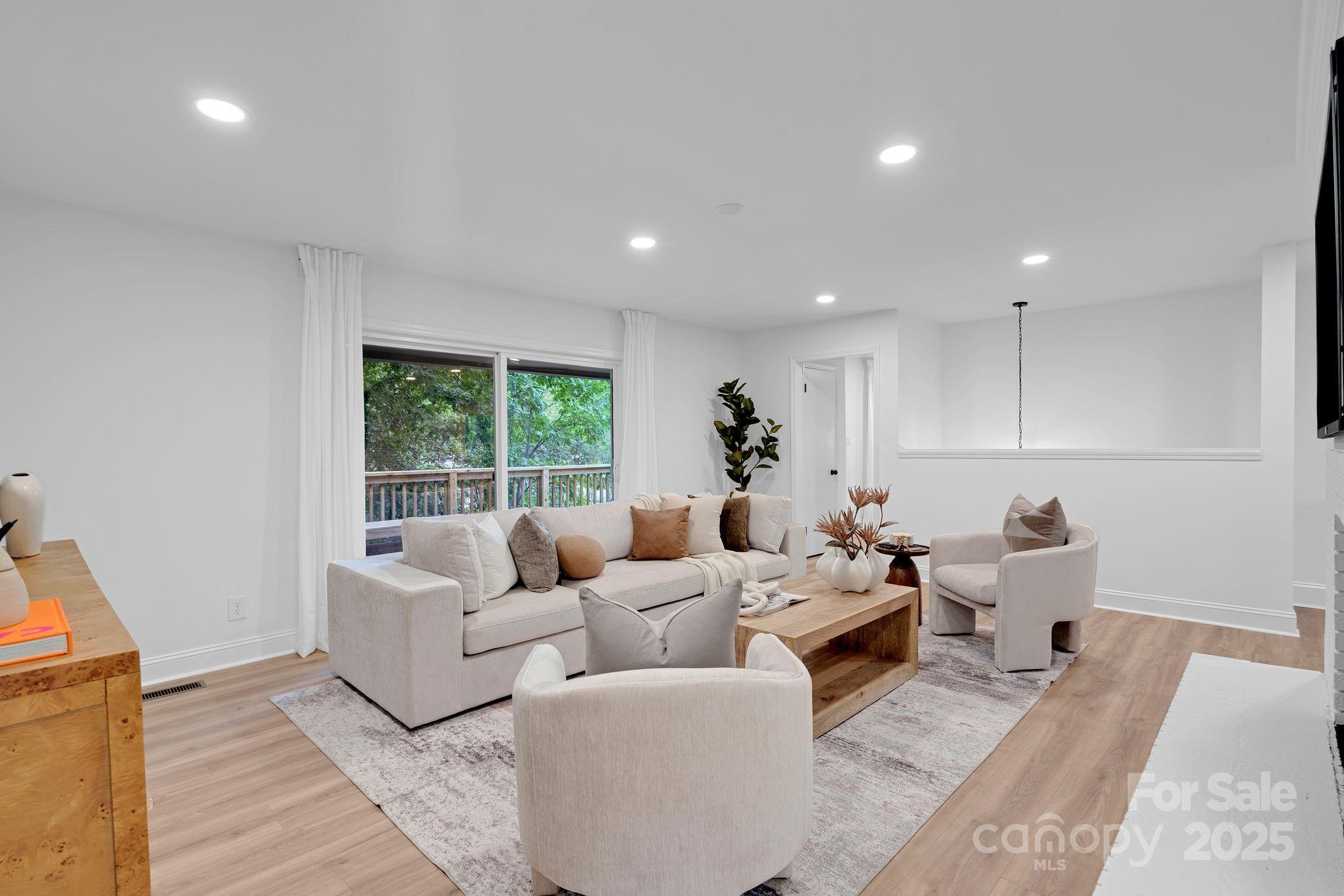 3200 Highview Road Charlotte, NC 28210 - Photo 18 of 48 a living room with furniture and large windows