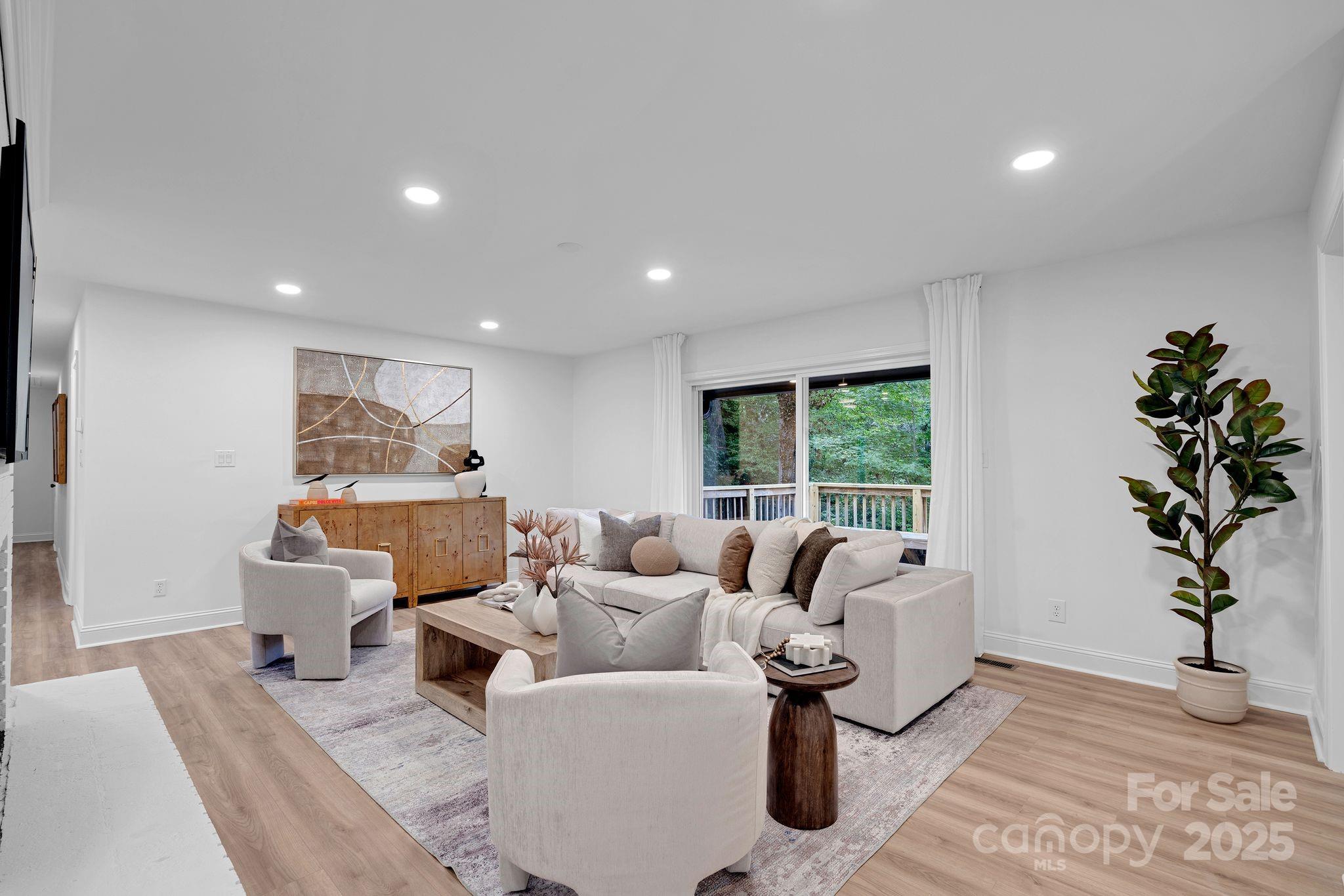 3200 Highview Road Charlotte, NC 28210 - Photo 19 of 48 a living room with furniture and a potted plant