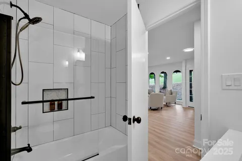 a bedroom with furniture and window