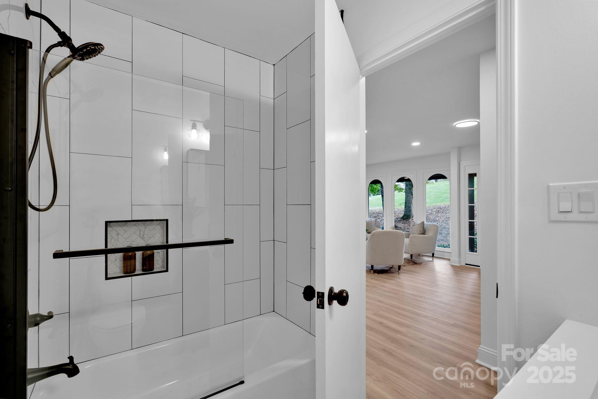 3200 Highview Road Charlotte, NC 28210 - Photo 31 of 48 a bathroom with a bathtub and a shower