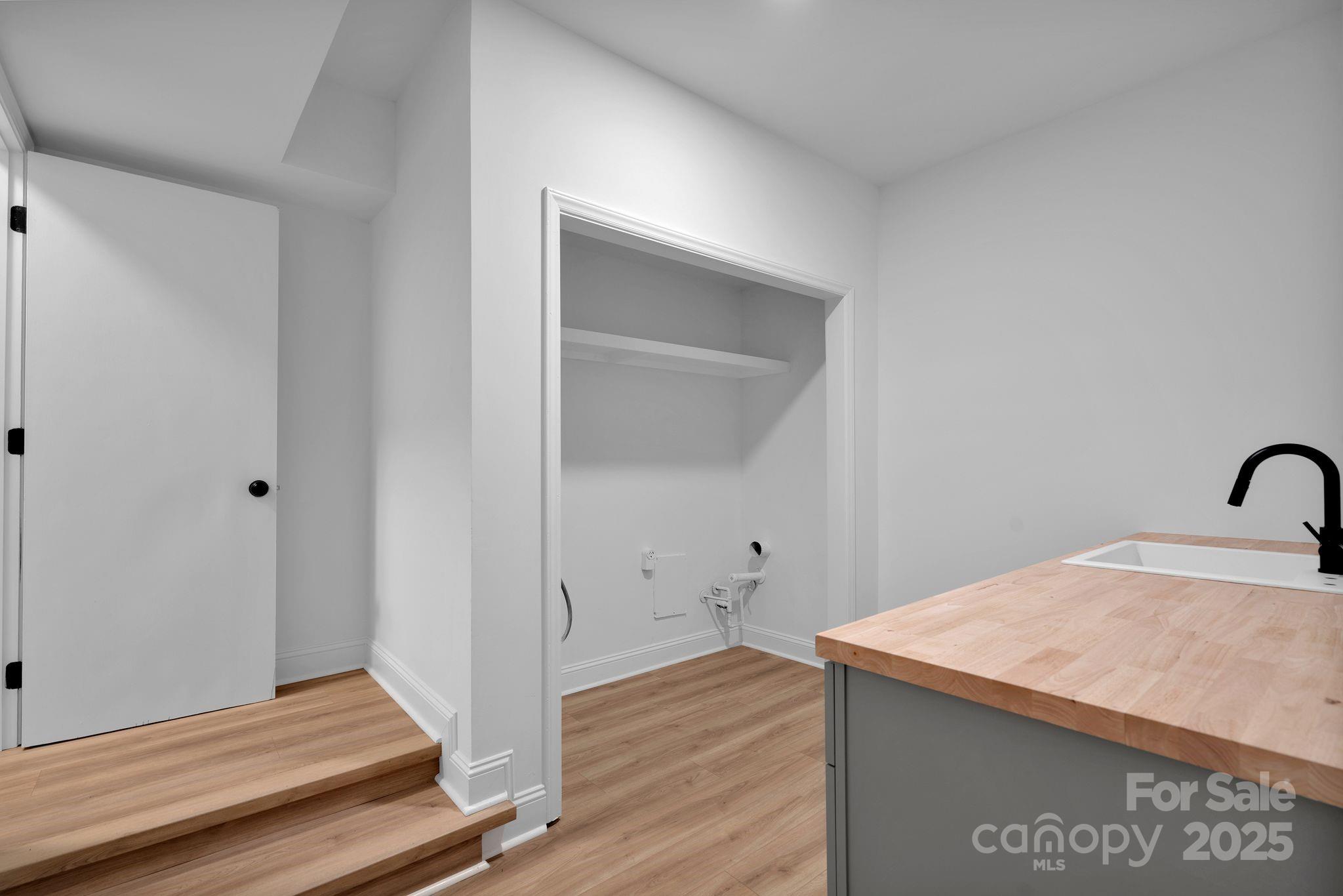 3200 Highview Road Charlotte, NC 28210 - Photo 40 of 48 a view of a kitchen with wooden floor and staircase