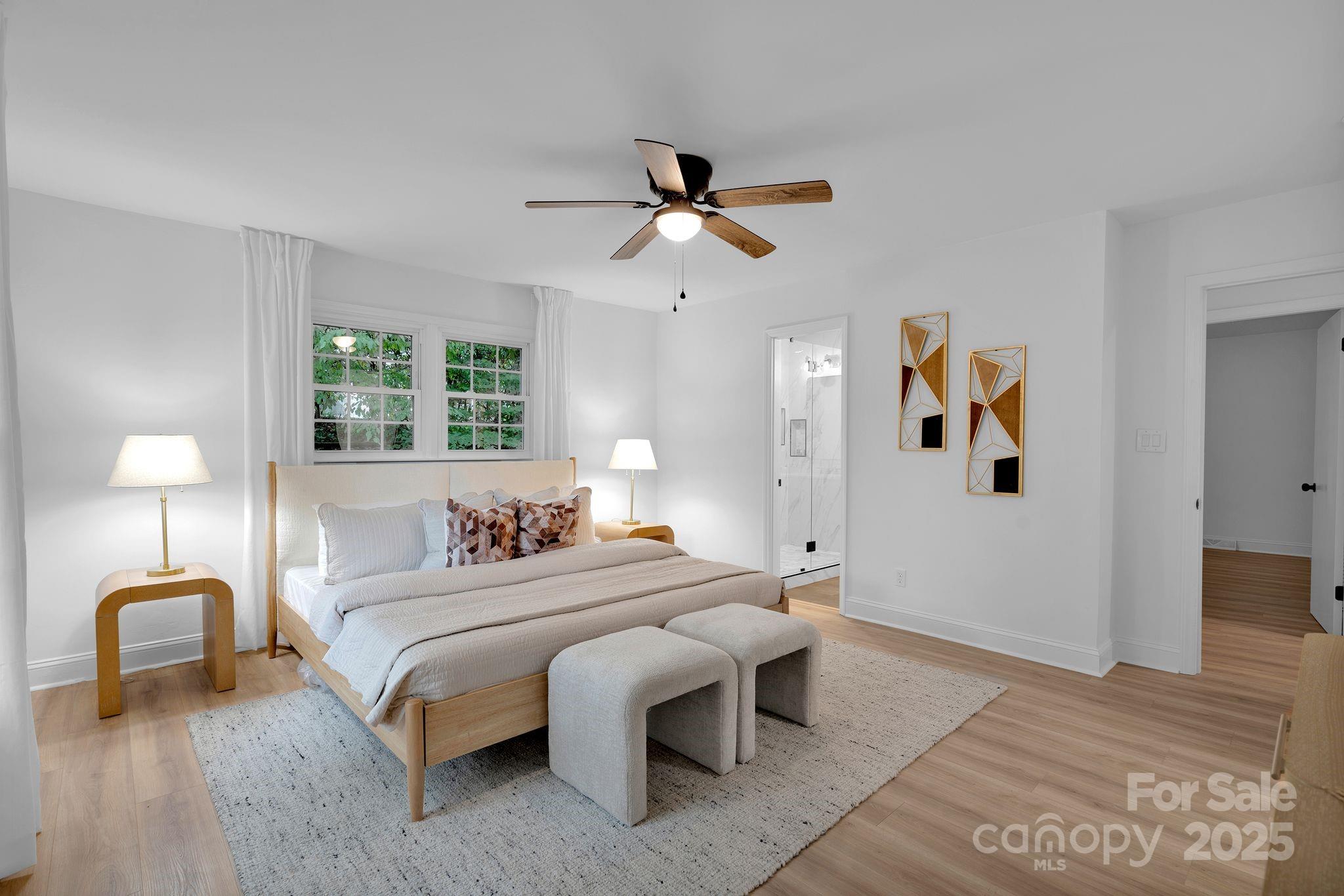 3200 Highview Road Charlotte, NC 28210 - Photo 7 of 48 a bedroom with a bed and a lamp