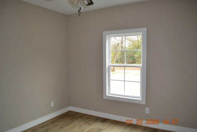 a kitchen with a sink and a window