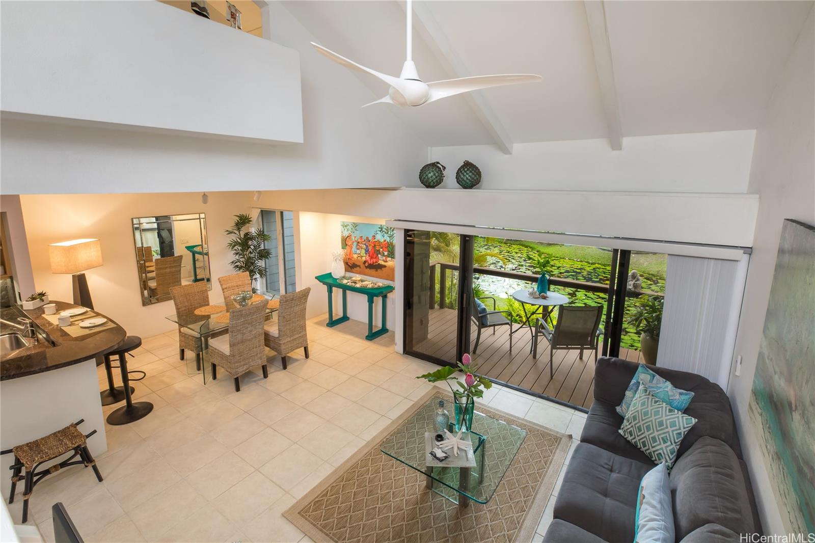 445 Kawailoa Road, Unit 4 Kailua, HI 96734 - Photo 11 of 23 a living room with furniture and a large window