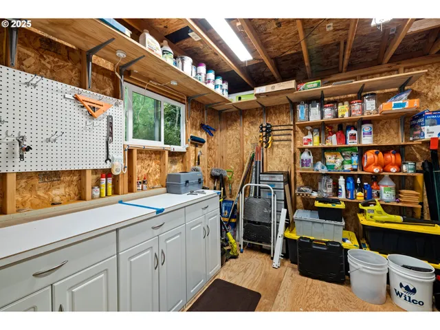 a view of a kitchen with furniture and a window