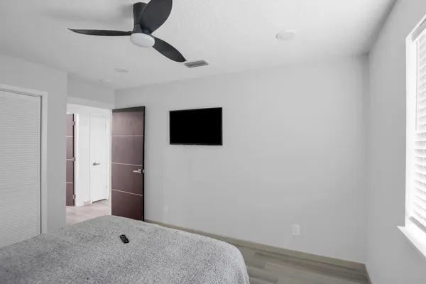 a view of a livingroom with a flat screen tv