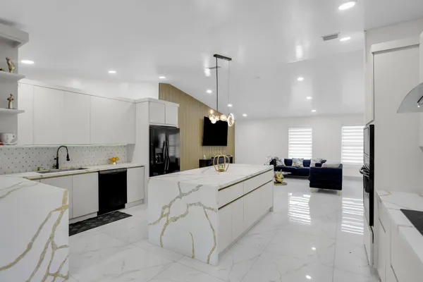 a view of kitchen with furniture and window