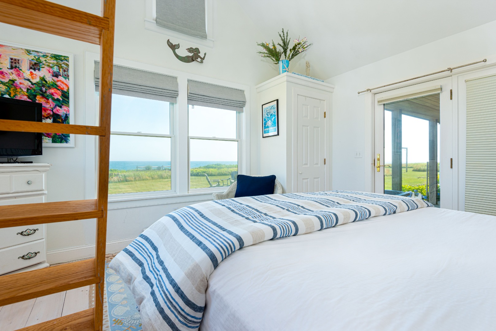 56 R Madequecham Valley Road Nantucket, MA 02554 - Photo 32 of 52 a bedroom with a bed and a window