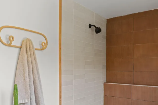 a view of a patio with a table and chairs