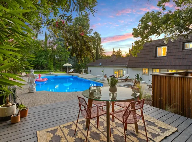 a stove top oven sitting inside of a kitchen