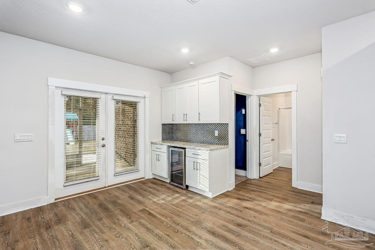 5665 Blake Lane Pace, FL 32571 - Photo 17 of 44 a view of a kitchen with a sink and a stove top oven