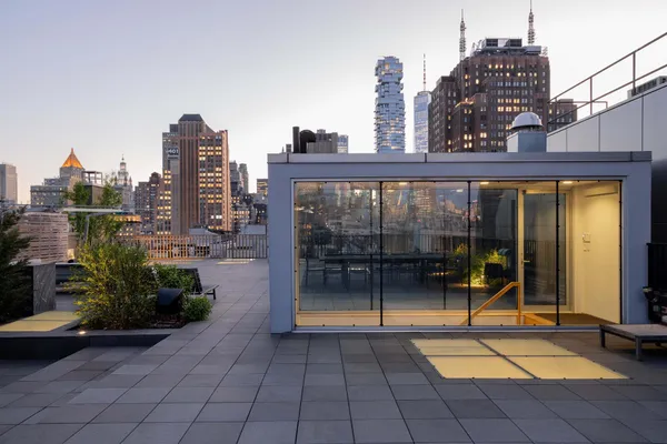 a view of a terrace with sitting area