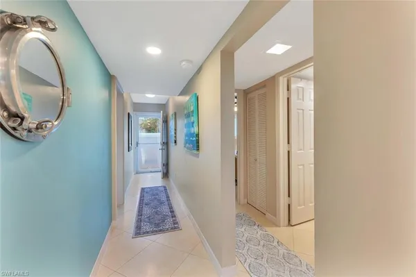 a bathroom with a glass door and shower