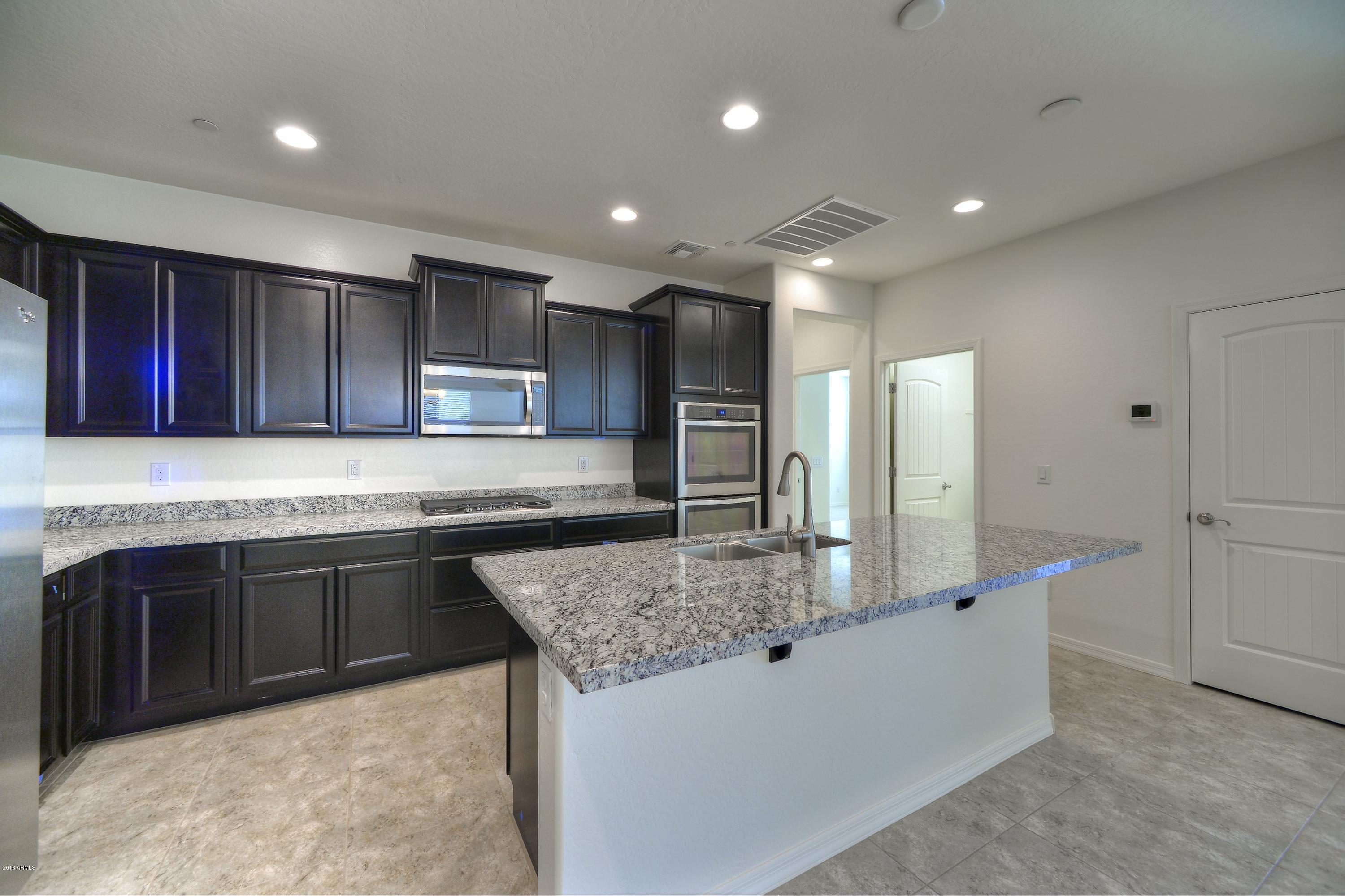 21453 West Berkeley Road Buckeye, AZ 85396 - Photo 6 of 29 BH Kitchen 3