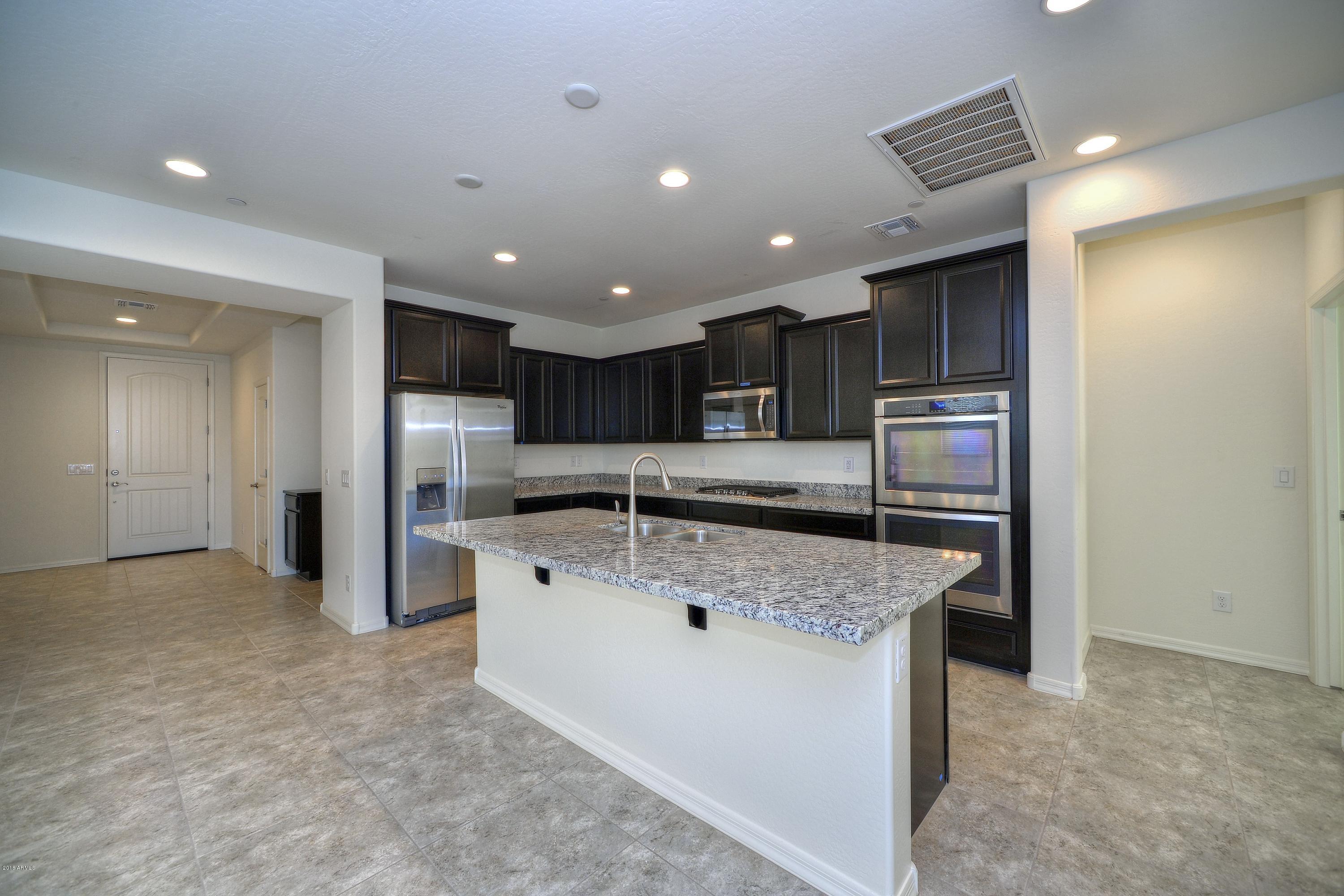 21453 West Berkeley Road Buckeye, AZ 85396 - Photo 7 of 29 BH Kitchen 4