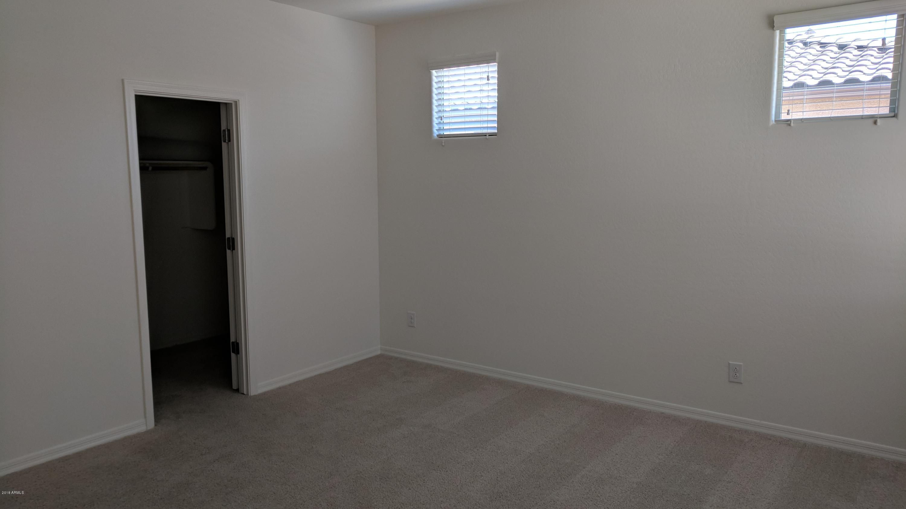 21453 West Berkeley Road Buckeye, AZ 85396 - Photo 10 of 29 Master BR walk-in closet