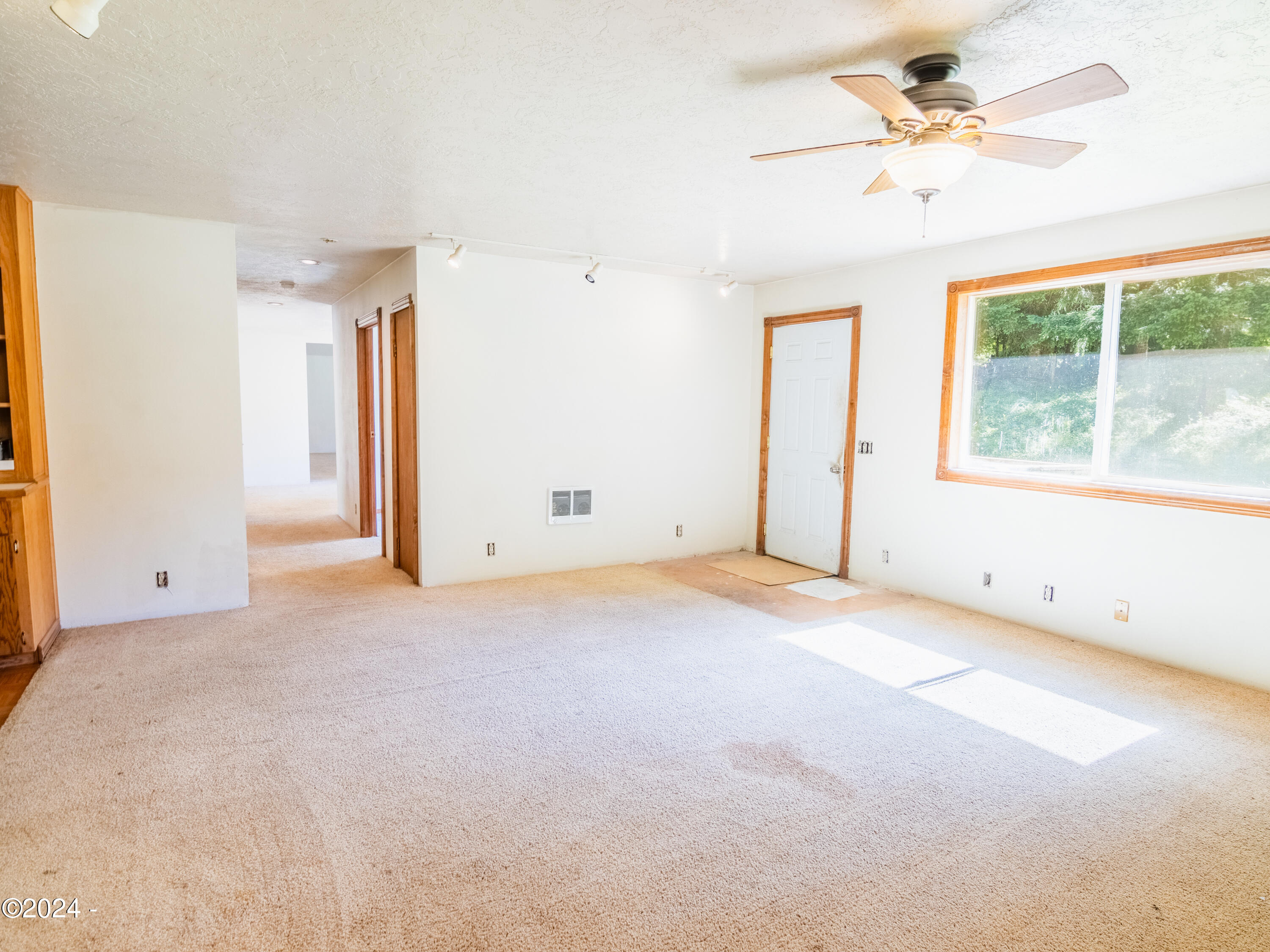 909 Christiansen Road Toledo, OR 97391 - Photo 12 of 43 Living Room off kitchen