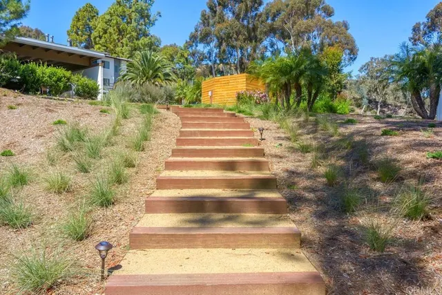a view of swimming pool from a balcony