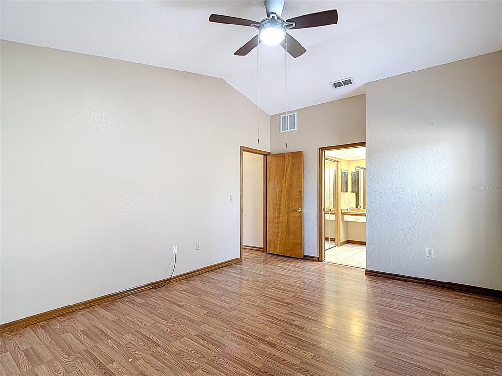 5066 Woodbine Street Spring Hill, FL 34608 - Photo 32 of 59 a view of an empty room and window