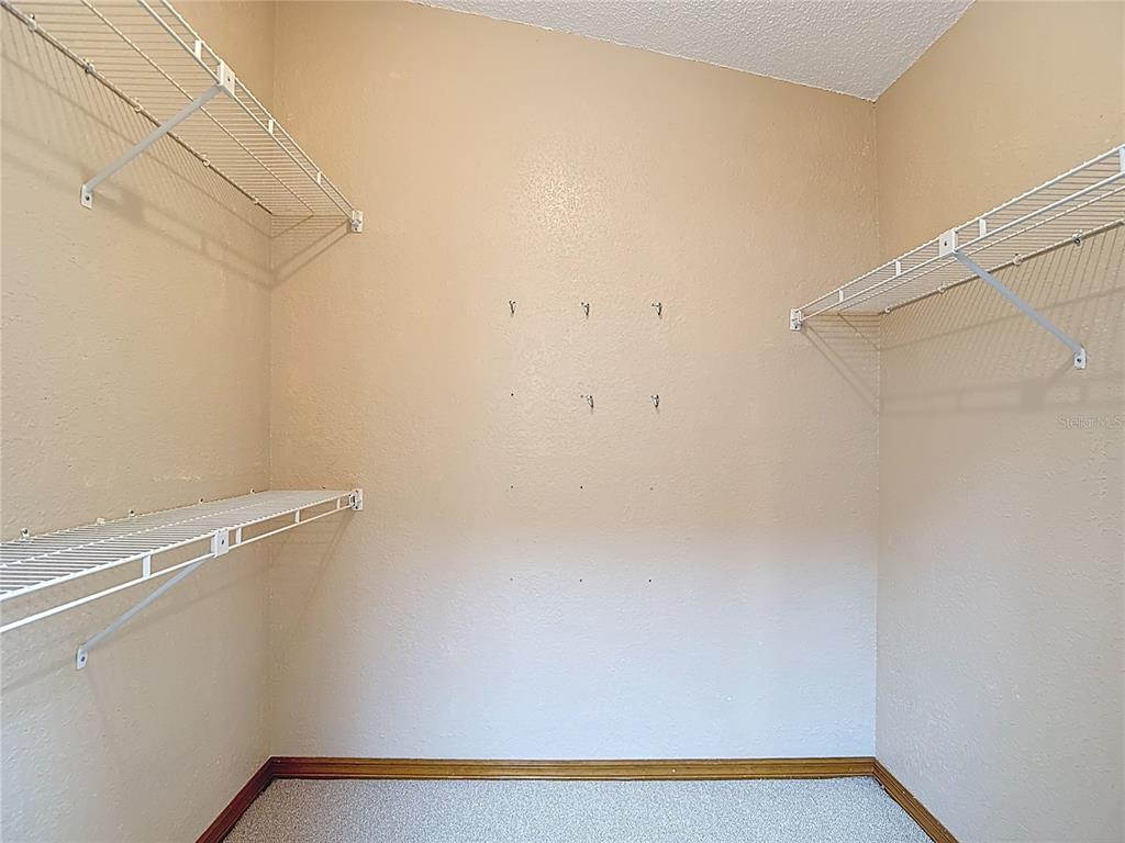5066 Woodbine Street Spring Hill, FL 34608 - Photo 39 of 59 a view of small space with racks on the wall