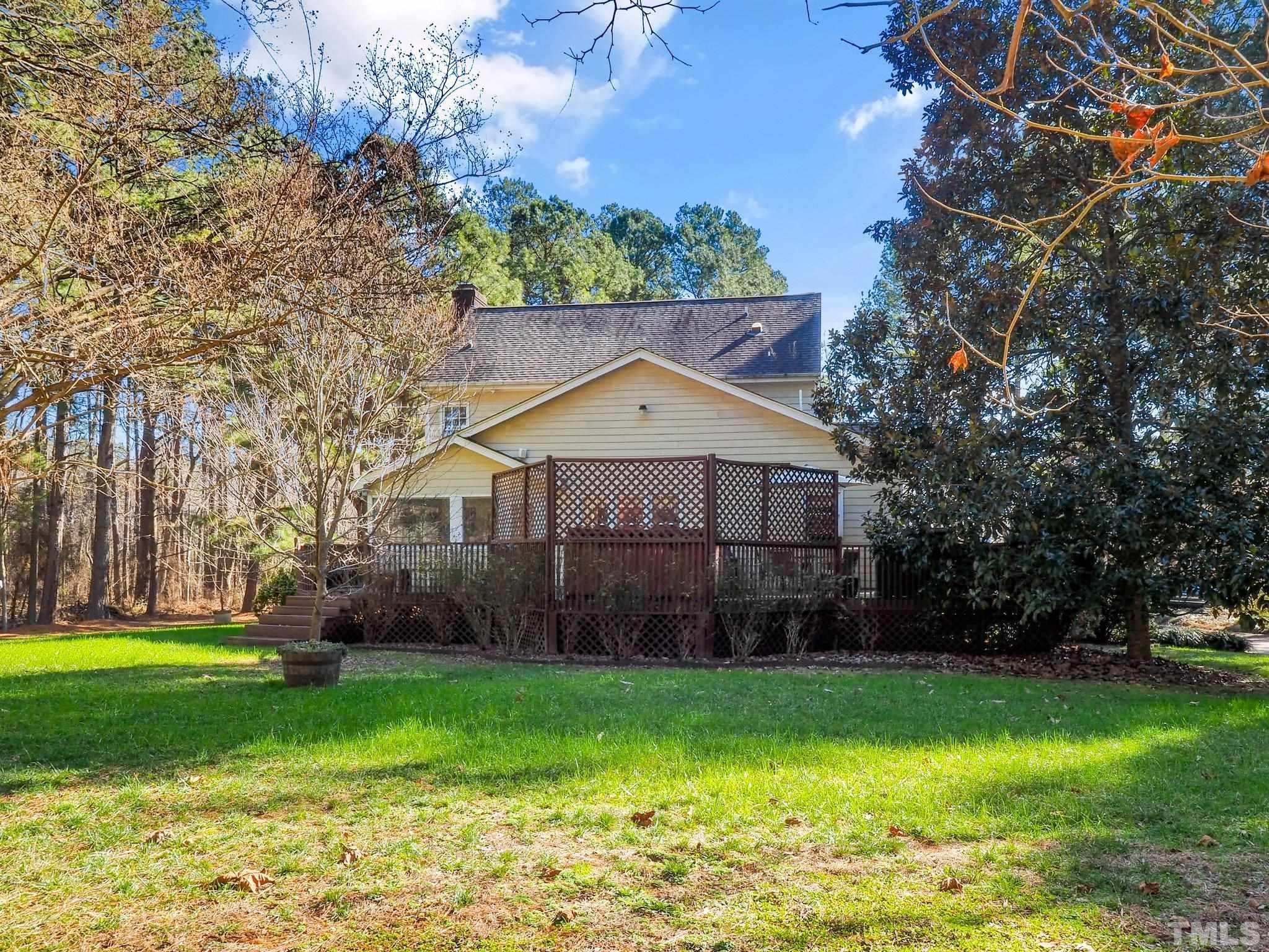 6030 Forestville Road Raleigh, NC 27604 - Photo 14 of 15 a front view of a house with garden