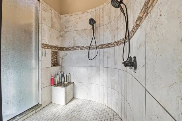 a view of a patio with a table and chairs